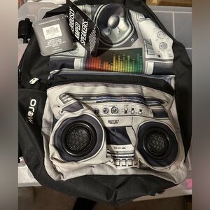 MOJO Back Pack w/ability to play something that plugs in. NEW! See photos.